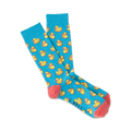 Pair of light blue crew socks with a repeating pattern of yellow rubber ducks.  Coral-colored heel and toe.