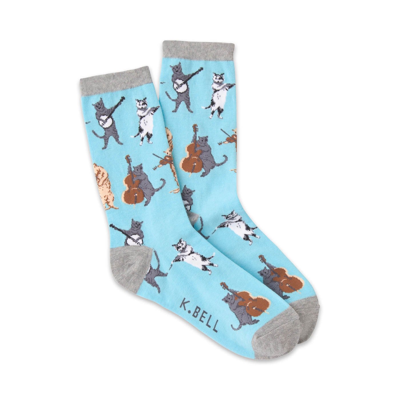 Crew socks in light blue featuring cats playing musical instruments (banjo, cello, violin).  Cats are grey, black, and tan. Fun and whimsical design.