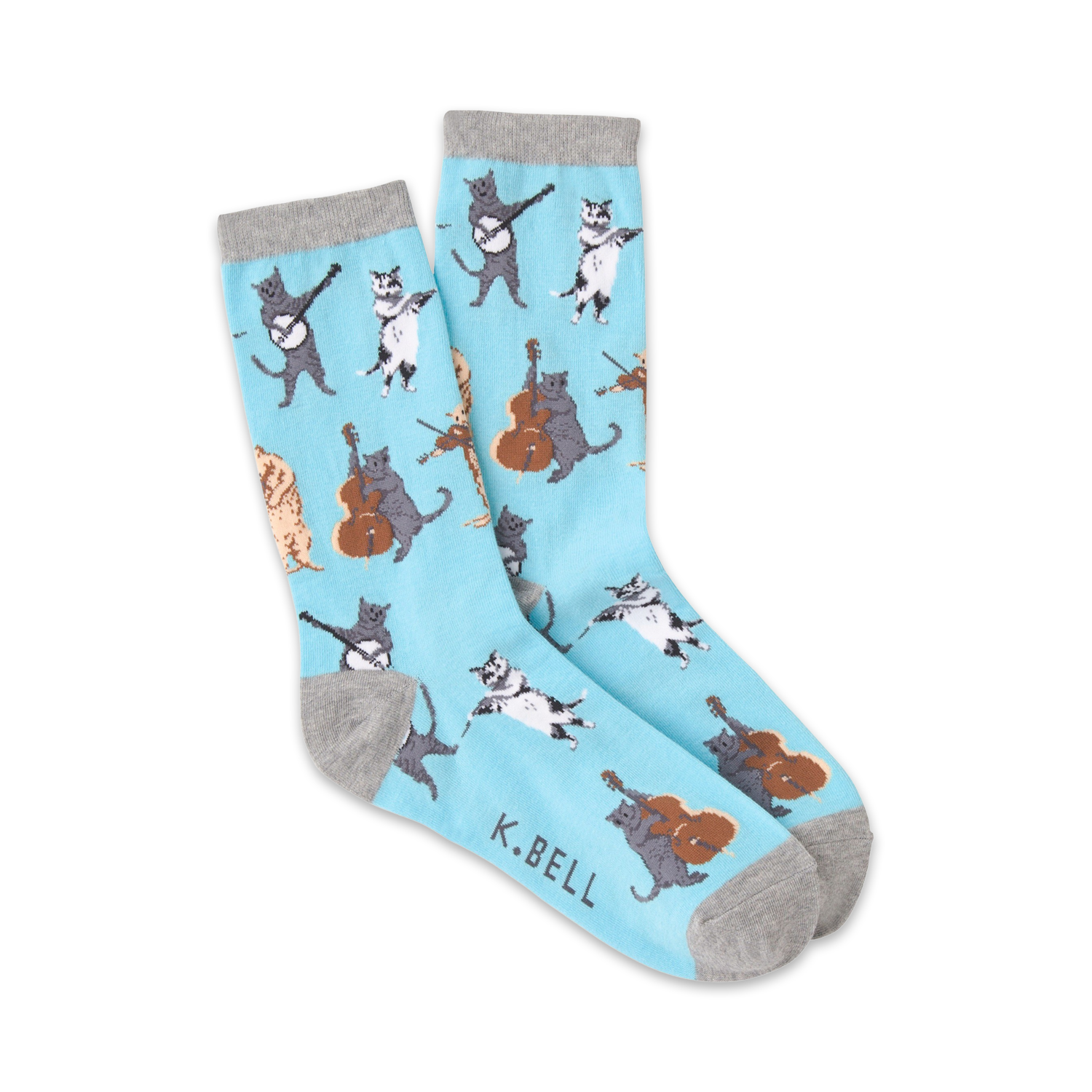 Crew socks in light blue featuring cats playing musical instruments (banjo, cello, violin).  Cats are grey, black, and tan. Fun and whimsical design.