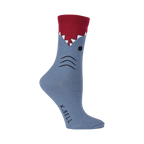 Close-up view of a single blue and red shark sock.