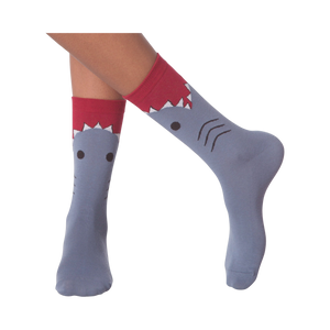 Lifestyle shot of a person wearing the shark socks.