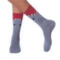 Lifestyle shot of a person wearing the shark socks.