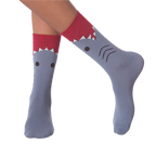 Lifestyle shot of a person wearing the shark socks.