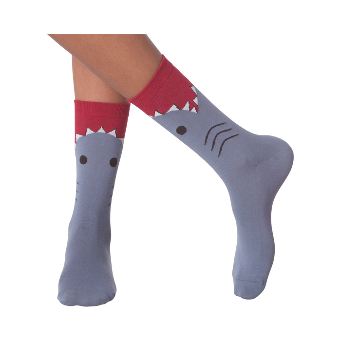 Lifestyle shot of a person wearing the shark socks.