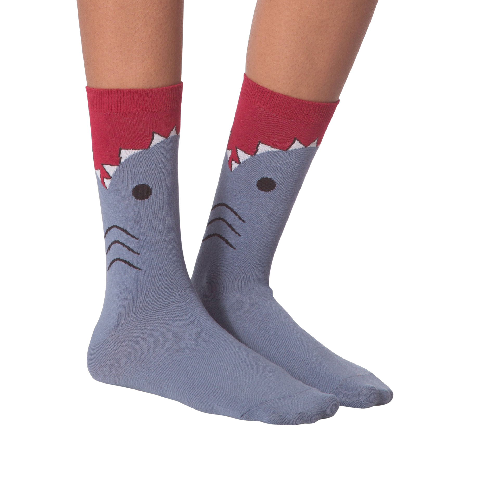 Flatlay showcasing a pair of blue crew socks with a shark face design.