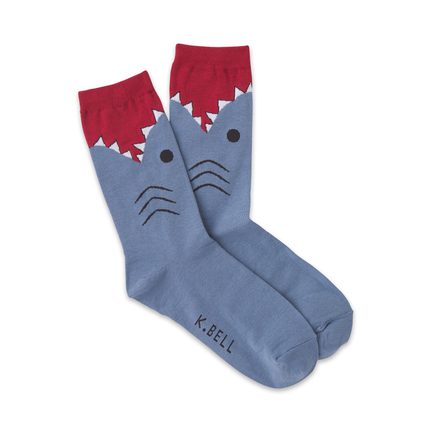 Pair of blue crew socks with a cartoon shark face design. The shark's mouth is red with white teeth.