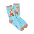 Pair of light blue crew socks with orange foxes sitting on each sock. The socks have a tan cuff.