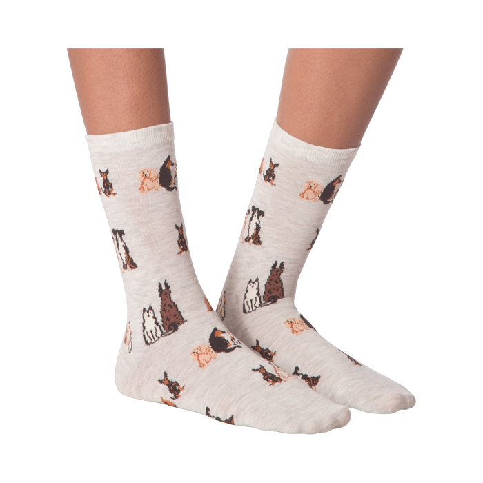 Close-up studio shot of a pair of the grey crew socks; showcasing the dog pattern.