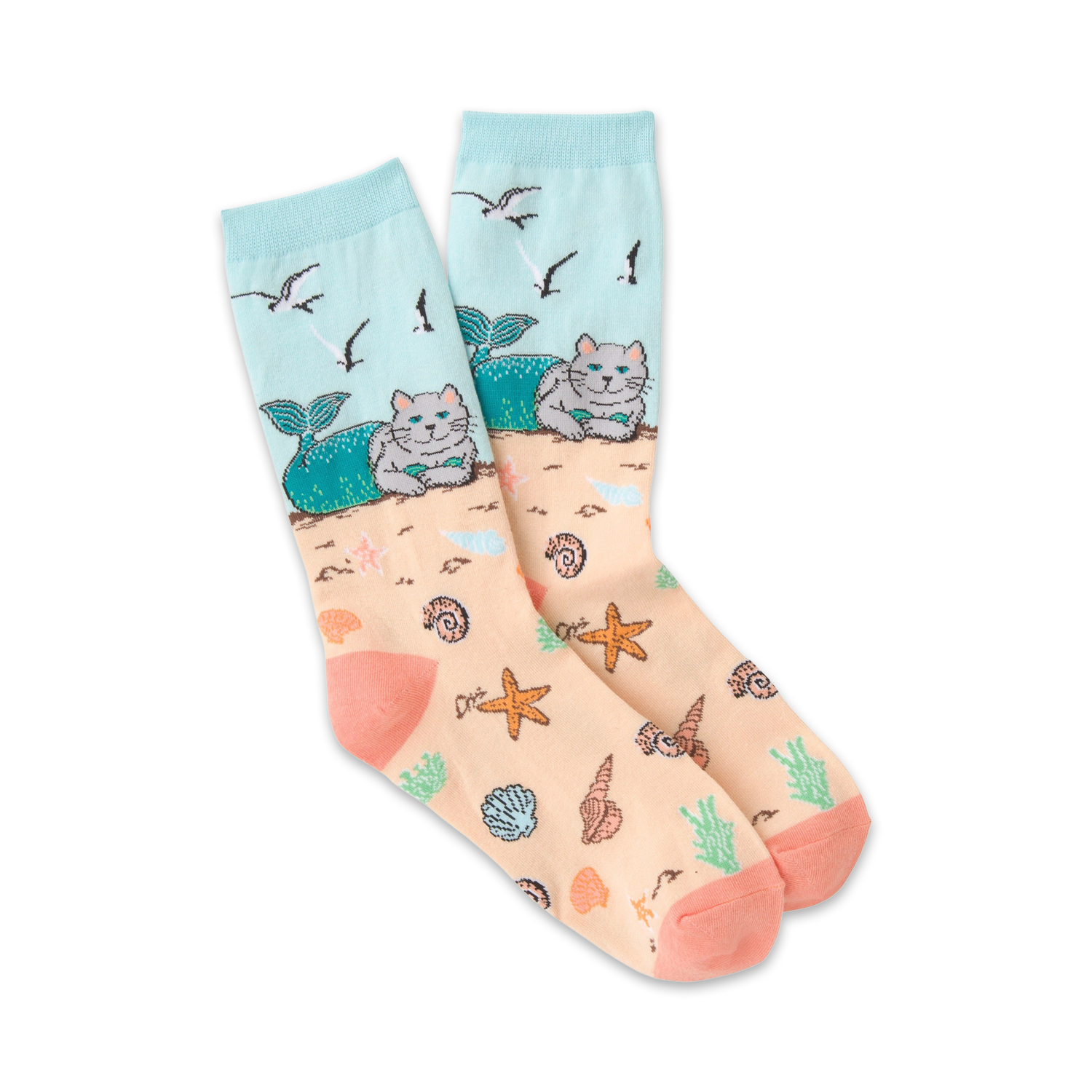 Crew socks featuring peach, teal, and gray colors. Design includes cats with mermaid tails on a beach with seashells and starfish.