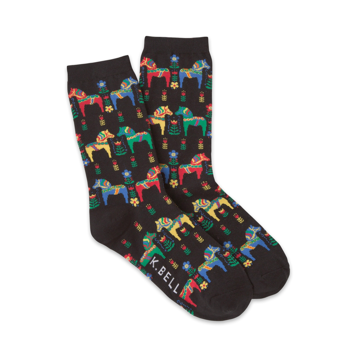 Pair of crew socks with a black background featuring a pattern of colorful Swedish Dala horses and flowers. The socks are predominantly black, red, yellow, blue, and green.