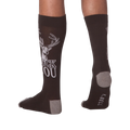 Back view of a person wearing a pair of 'Buck You' socks.