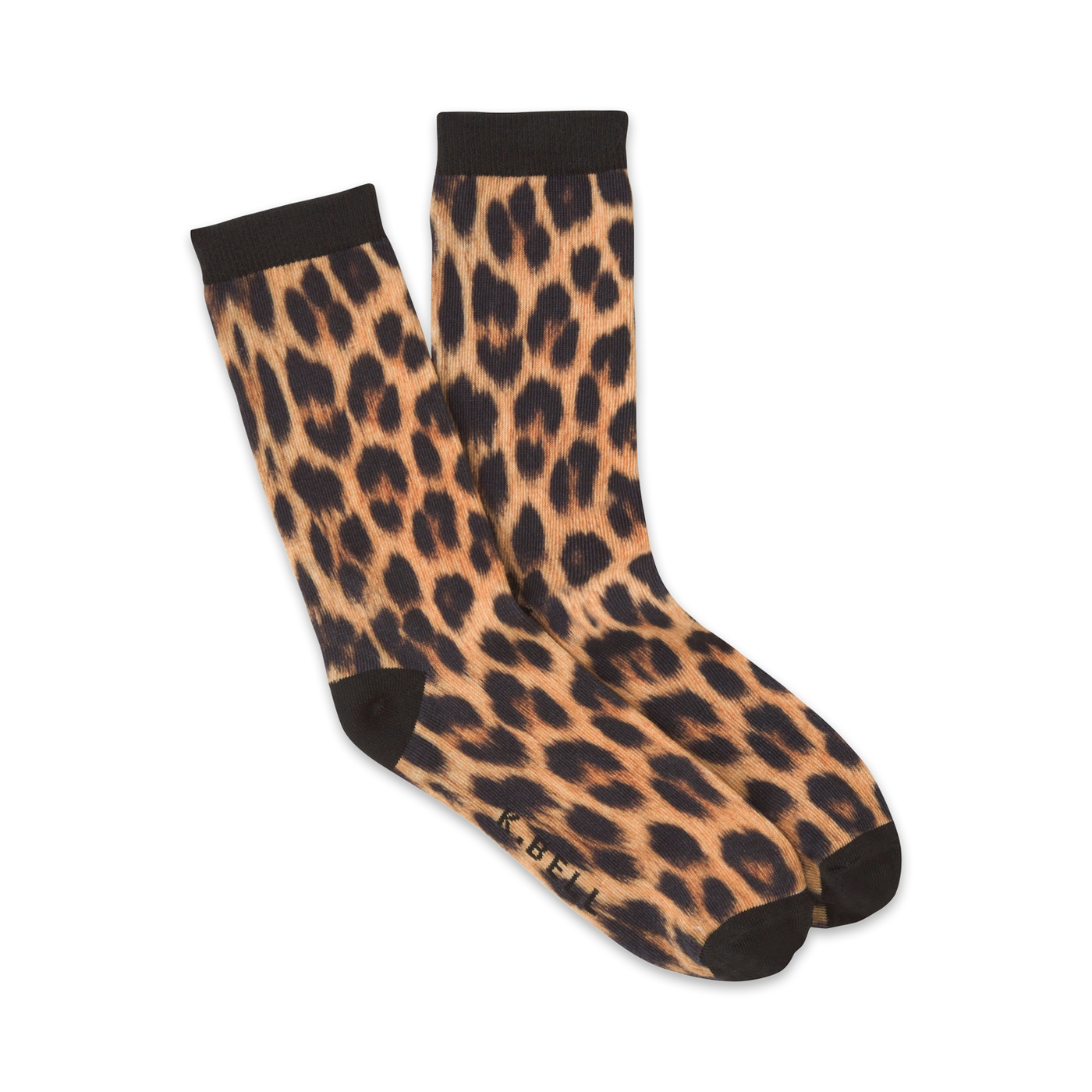A pair of women's crew socks in a tan and black leopard print. The socks are folded to show both sides of the print.