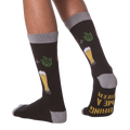 Lifestyle shot of a person wearing the 'Bring Me A Beer' socks, demonstrating fit and style.