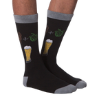 Pair of 'Bring Me A Beer' socks lying flat showcasing the full design, including text on the cuff.