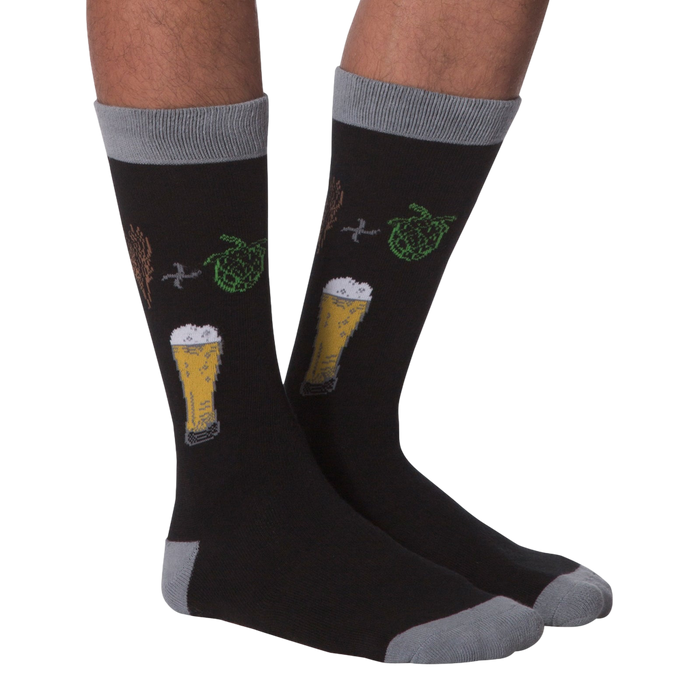 Pair of 'Bring Me A Beer' socks lying flat showcasing the full design, including text on the cuff.