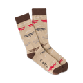 Pair of beige crew socks with a pattern of red, brown, and navy biplanes and clouds. Brown cuff. 'K.Bell' subtly printed on the sock.