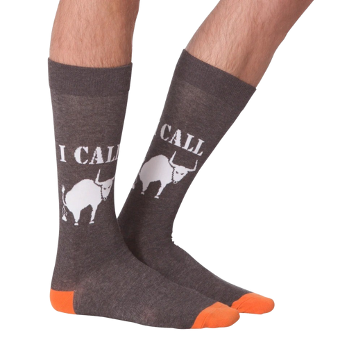 Lifestyle shot of a person's legs wearing the 'I Call Bullshit' socks, showing the fit and style.