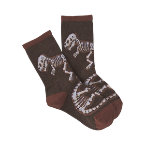 Pair of brown crew socks with a pattern of beige dinosaur skeletons. 