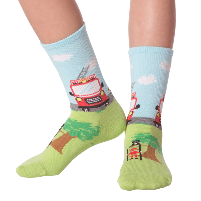 Lifestyle shot of Fireman socks on a person's feet, showing the full sock design.