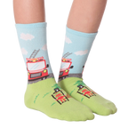 Another lifestyle shot of Fireman socks on feet, showcasing the sock's fit and design.