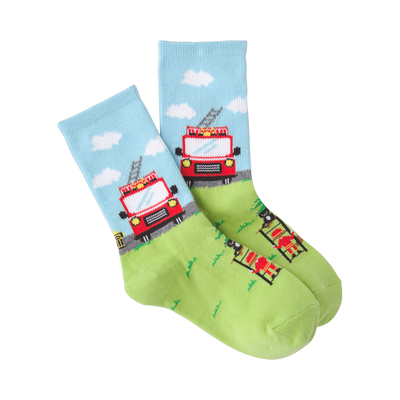 Pair of crew socks; light blue with clouds and red firetruck, lime green with firefighter and tree. Playful design.