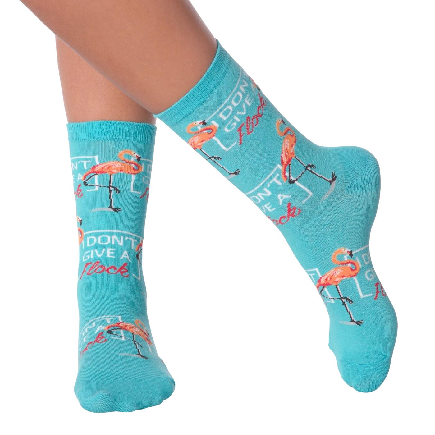 Lifestyle shot of model wearing 'I Don't Give a Flock' flamingo socks.