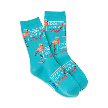 blue crew socks with pink flamingo pattern and the words 'i don't give a flock'  