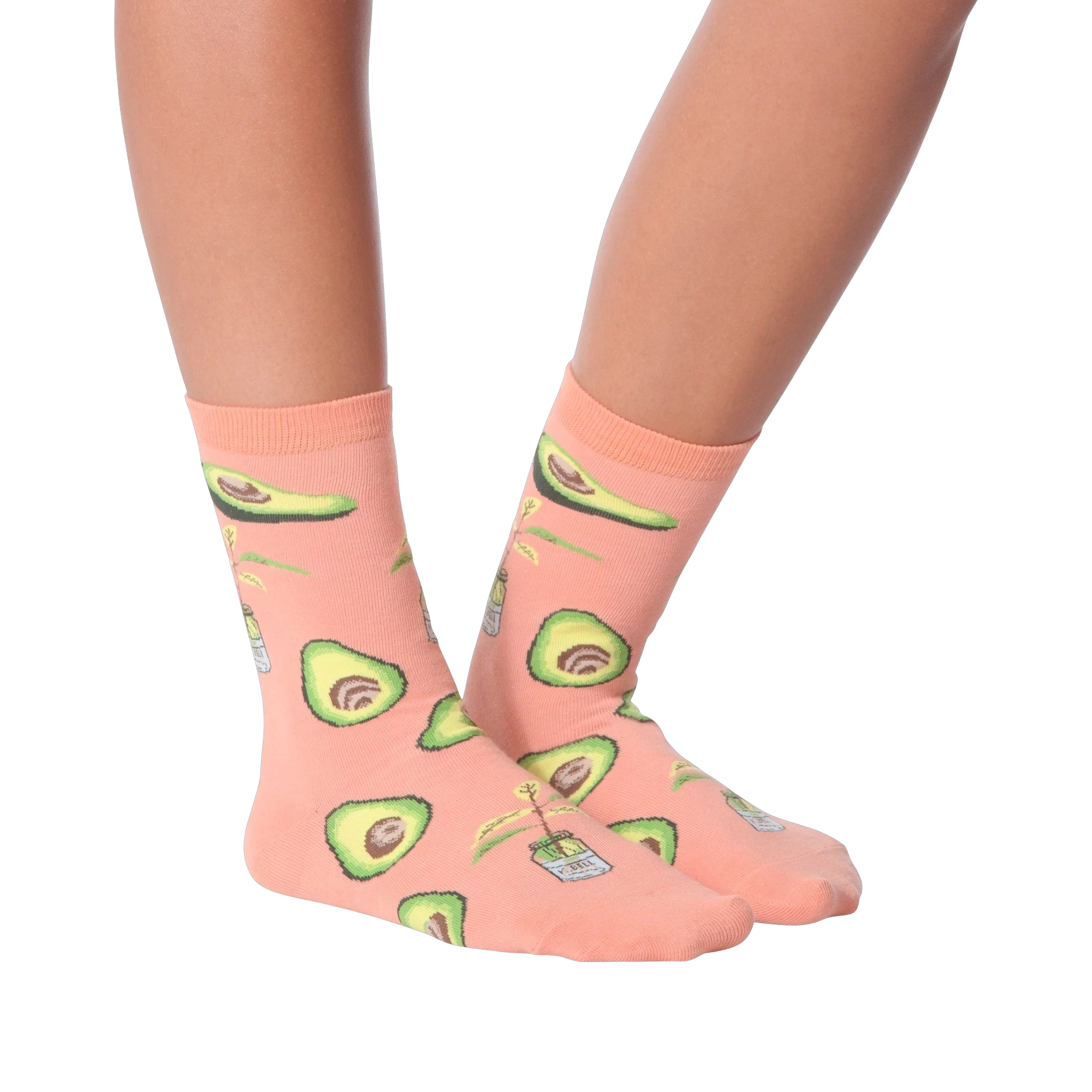 Lifestyle shot of woman's legs wearing peach avocado socks, different pose.