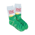 Pair of crew socks. Light blue, green, and red.  'Time To Wine Down' text and vineyard illustration.
