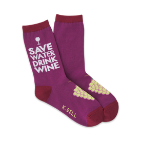 crew length purple socks for women with 'save water drink wine' text on the leg, grape graphic on the foot, and k. bell brand name on the sole.  