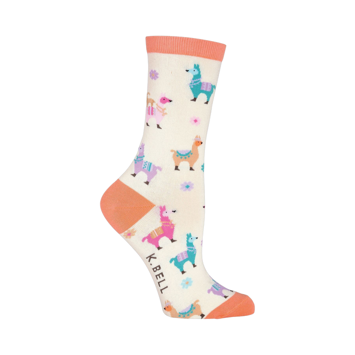 Side view of a single cream crew sock with coral pink cuff and pastel llama design on a black background.