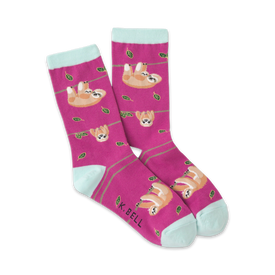 pink crew socks with a pattern of sloths hanging from green branches with dark green leaves. fun and funky socks for women.  