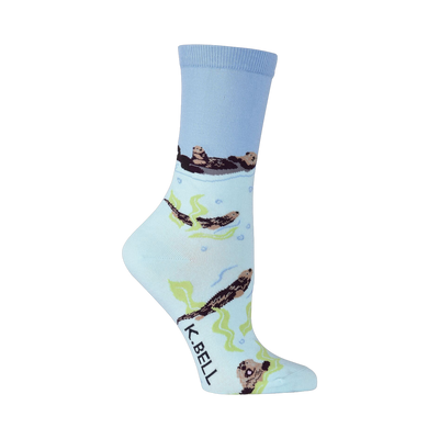 Crew socks in light blue, featuring otters swimming amongst kelp and bubbles.  A playful and charming design.