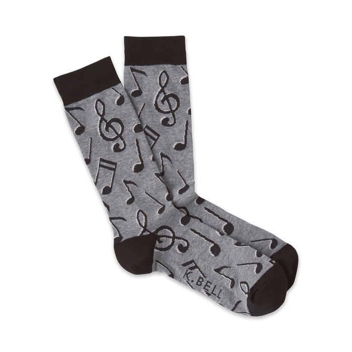 men's music notes crew socks: black treble clefs and eighth notes pattern on gray background.   }}