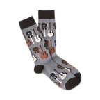 Pair of grey crew socks with a pattern of brown and white acoustic guitars. Dark brown cuff.