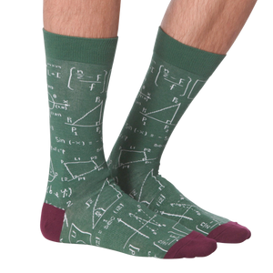 A pair of green socks with burgundy toes and heels. The socks are covered in white math equations and symbols.