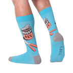 A person's legs wearing the 'Whoop Ass' socks. Shows the socks on feet.