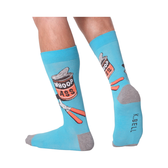 A person's legs wearing the 'Whoop Ass' socks. Shows the socks on feet.