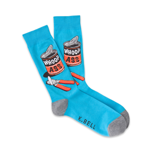Pair of blue crew socks with a graphic design of a can labeled 'Whoop Ass' and a can opener. Gray cuff.