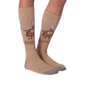 A pair of 'Hey! Shit Happens' socks laid flat to show the full design.