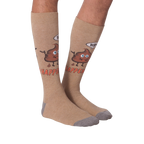 A pair of 'Hey! Shit Happens' socks laid flat to show the full design.