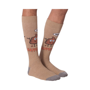 A pair of 'Hey! Shit Happens' socks laid flat to show the full design.