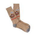 Tan crew socks with a whimsical brown poop emoji design. The emoji says 'Hey!' and the socks read 'Shit Happens'.