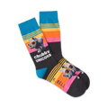 A pair of crew socks in teal, black, yellow, orange, and pink, features a graphic of a rhino wearing sunglasses and the words 'chubby unicorn'.