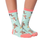 Flat lay product shot of the Musical Dogs socks, highlighting the design detail from a birds-eye perspective.