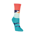 Lifestyle shot showcasing the Orca Whale socks on a model's feet, highlighting their fit and color in a casual setting.