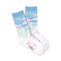 Pair of crew socks featuring pink flamingos on a light blue and white ombre background.