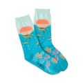 Pair of teal crew socks. Features a sunset scene, sea turtles swimming, coral, and bubbles. 