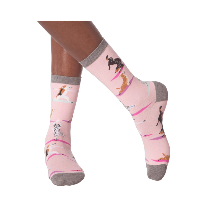 Lifestyle shot of woman's legs wearing Yoga Dogs socks and black sneakers.