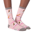 Flat lay of Yoga Dogs socks on a neutral background, showcasing the entire design.